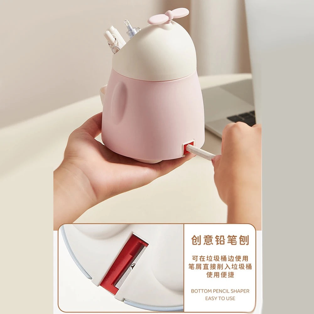 Pencil holder with sharpener