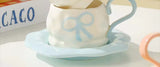 Bow ceramic mug saucer